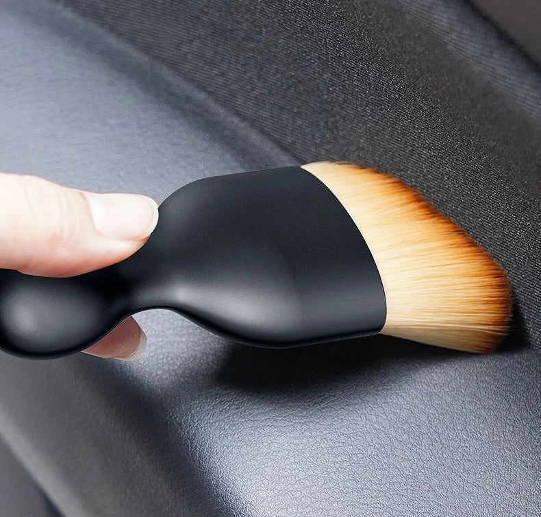 Car interior cleaning brush.